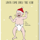 Humor kerstkaart met daarop een huilende baby met kerstmuts op en de tekst "Santa came early this year...you lucky bastards"